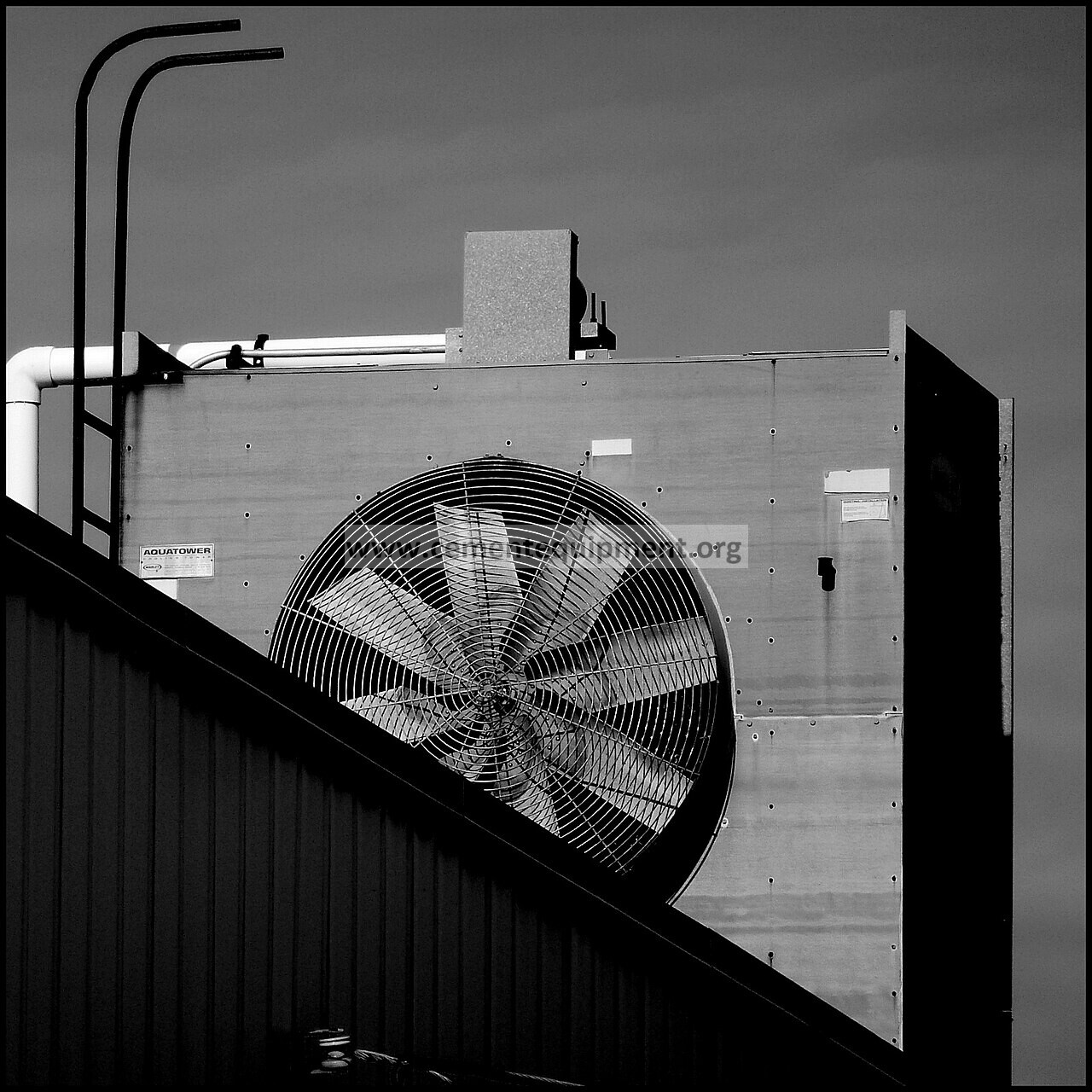 Industrial cooling tower fan used to diagnose worse approach temperature after cleaning by checking airflow, fan direction and water distribution